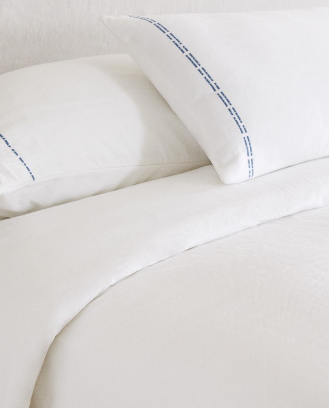 BEDSPREAD WITH BACKSTITCHING