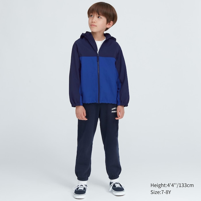 Pocketable Nylon Parka (Color Block) Removable hood allows versatile styling. Convenient pocketable design.