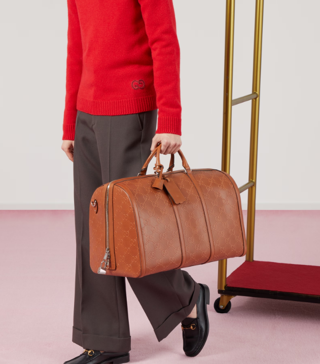 GUCCI GG EMBOSSED LARGE DUFFLE BAG